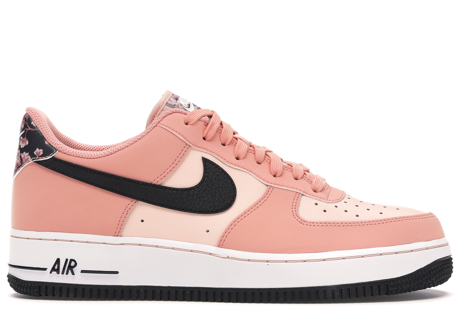 peach colored nike shoes
